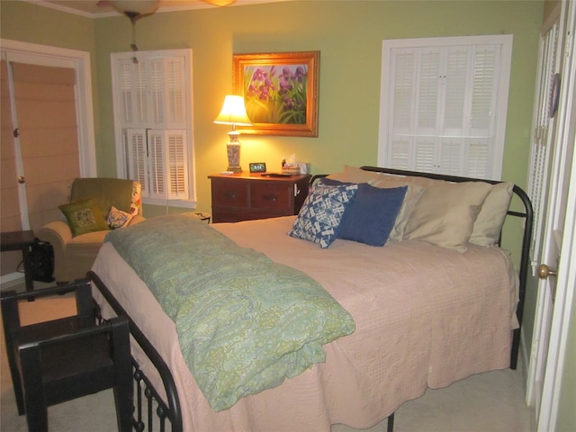 bedroom with crown molding