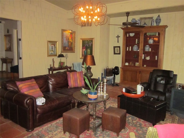 tiled living room featuring brick wall and a notable chandelier