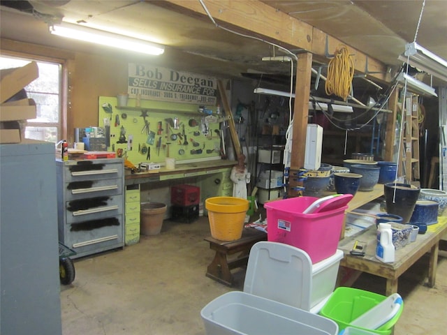 interior space featuring a workshop area