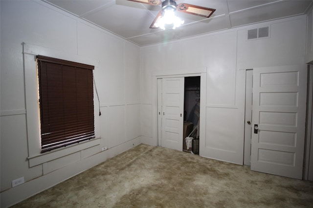 231 N 3rd Ave, Munday, TX 76371 - carpeted empty room with a ceiling fan