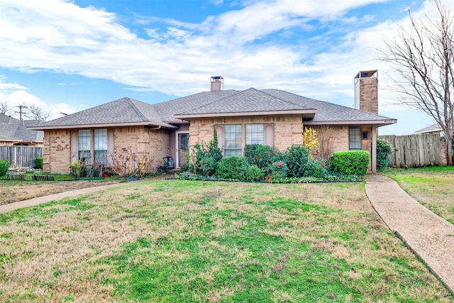 ranch-style house with a front yard