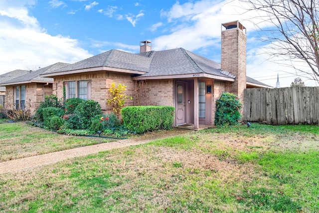 view of front of house with a front lawn