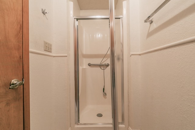 bathroom with an enclosed shower