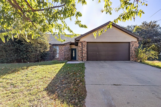 single story home with a garage and a front lawn