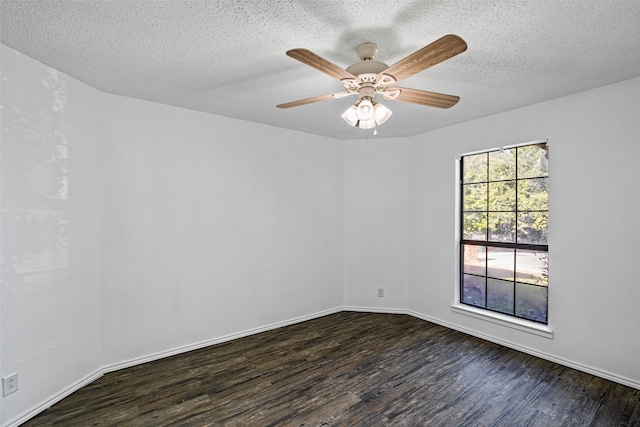 spare room featuring a textured ceiling, dark hardwood / wood-style flooring, and ceiling fan