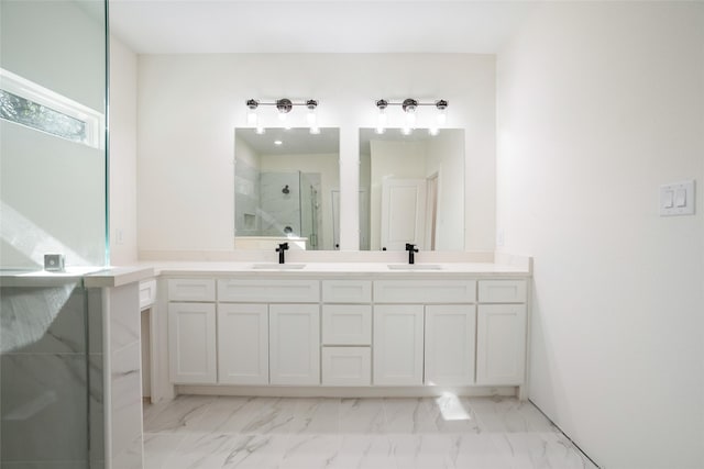 bathroom featuring vanity and a shower with shower door