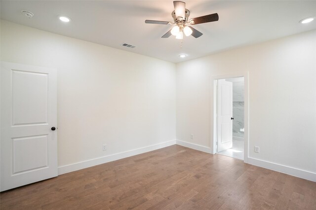 unfurnished room featuring wood-type flooring and ceiling fan