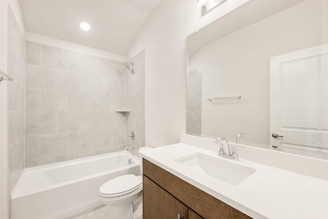 bathroom featuring shower / bathing tub combination, vanity, and toilet