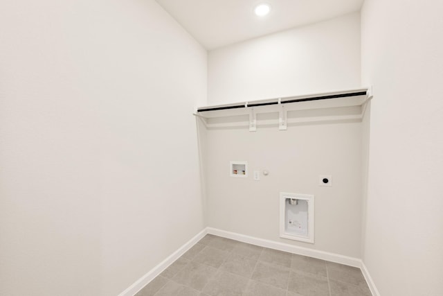 washroom with hookup for a gas dryer, laundry area, washer hookup, baseboards, and electric dryer hookup