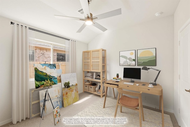 office area featuring a ceiling fan, visible vents, vaulted ceiling, and carpet flooring