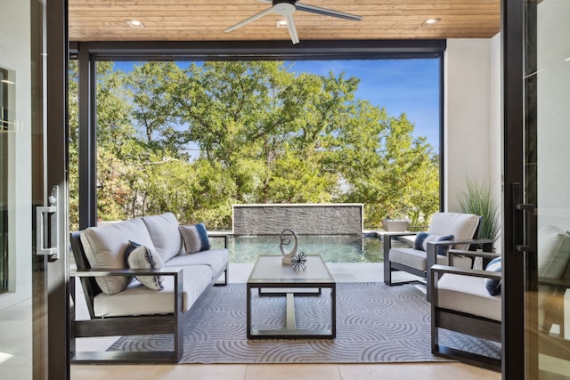 sunroom / solarium with a wealth of natural light and wood ceiling