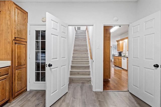 105 Lost Oaks Dr, Waco, TX 76705 - stairway with wood finished floors