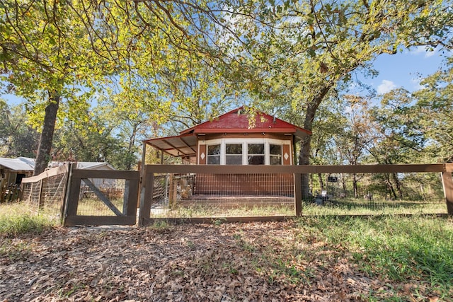 exterior space featuring an outbuilding