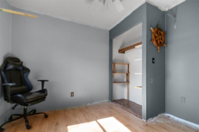 interior space with hardwood / wood-style flooring and ceiling fan