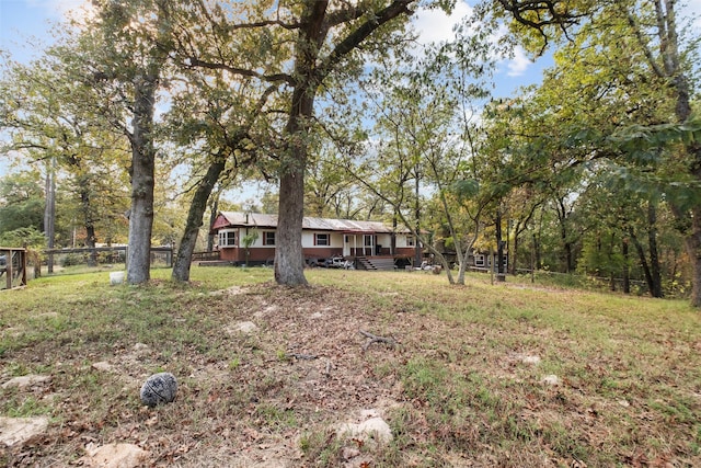 view of yard with a deck