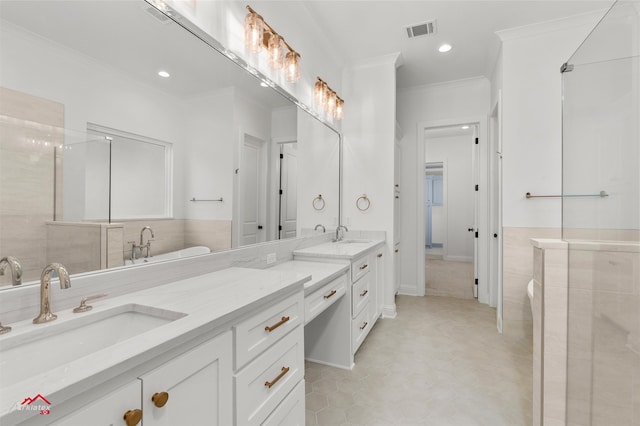 bathroom featuring vanity, a bathtub, and crown molding