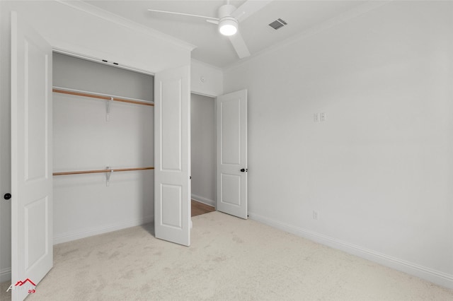 35 Turtle Creek Dr, Benton, LA 71006 - unfurnished bedroom with carpet, a closet, ornamental molding, and ceiling fan