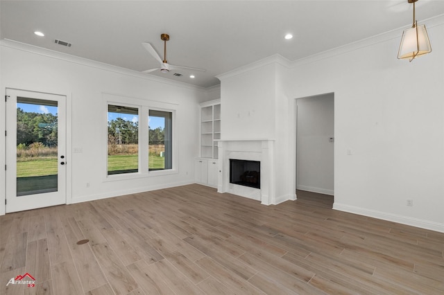 35 Turtle Creek Dr, Benton, LA 71006 - unfurnished living room featuring ornamental molding, ceiling fan, light wood-style flooring, recessed lighting, and a fireplace