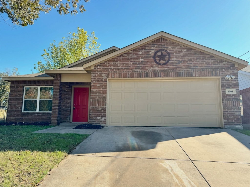 ranch-style home with a garage