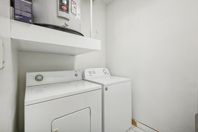 washroom featuring washer and dryer