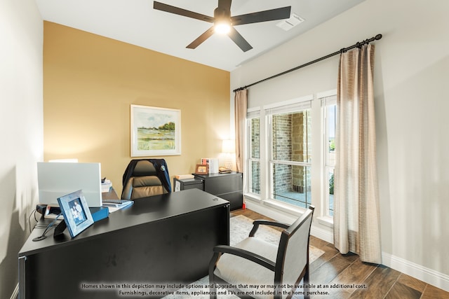 office space featuring ceiling fan and dark hardwood / wood-style flooring