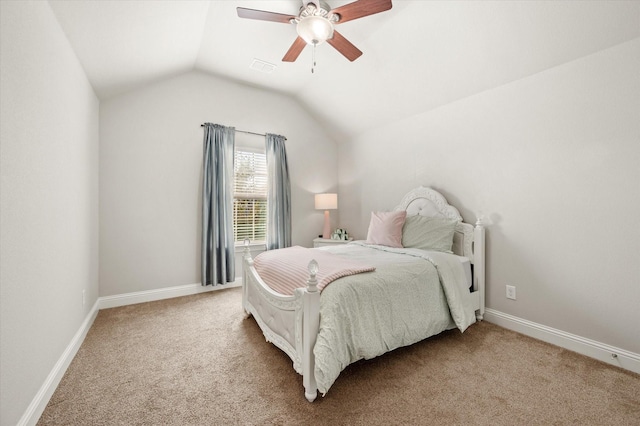 bedroom featuring ceiling fan, lofted ceiling, and carpet flooring