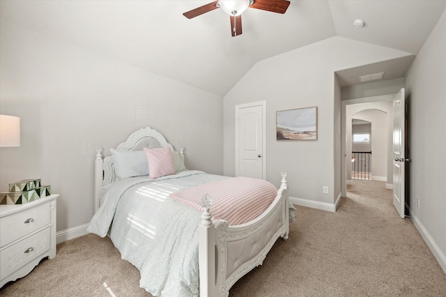 bedroom with ceiling fan, light carpet, and lofted ceiling