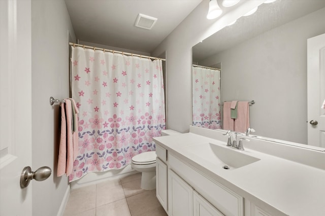 full bathroom featuring tile patterned flooring, vanity, toilet, and shower / bathtub combination with curtain