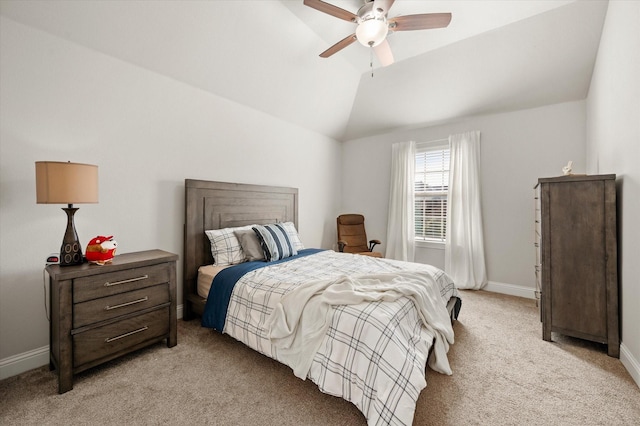 bedroom with ceiling fan, light colored carpet, and lofted ceiling