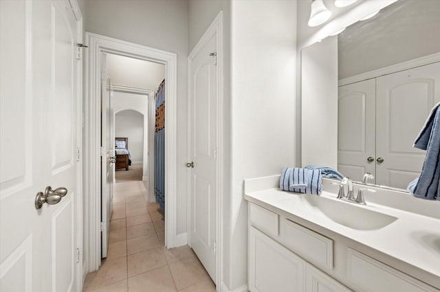 bathroom with vanity and tile patterned flooring