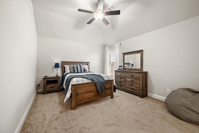 carpeted bedroom featuring lofted ceiling and ceiling fan