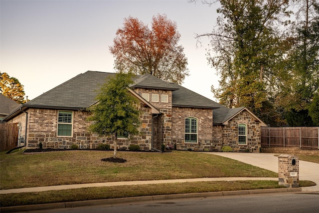 view of front of home with a front lawn