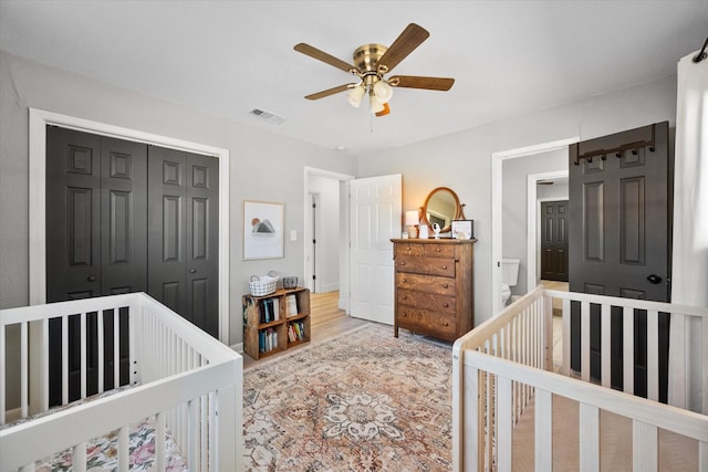 300 L S P Cir, Kerens, TX 75144 - bedroom with a closet, wood finished floors, a ceiling fan, and a nursery area