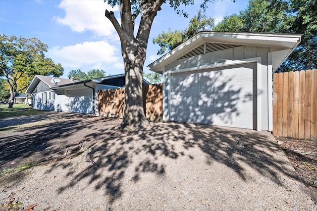 ranch-style home with a garage