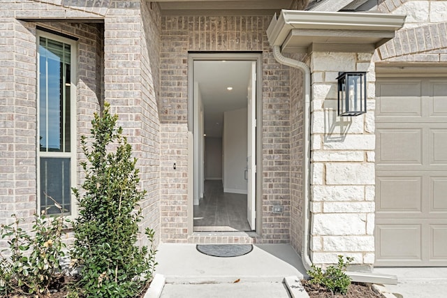 property entrance with a garage