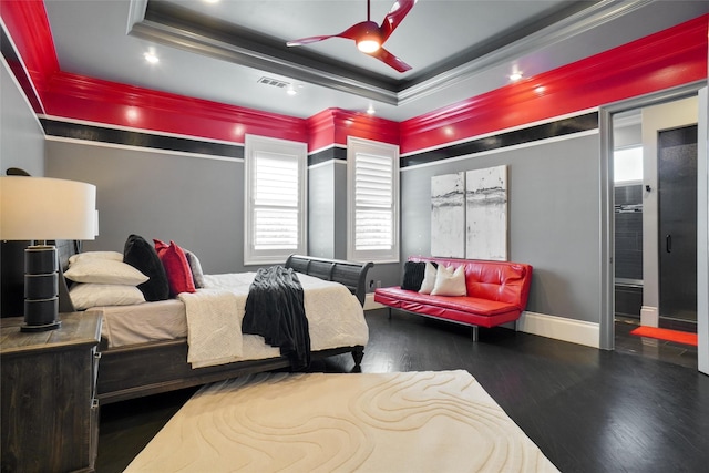 2009 E Highland St, Southlake, TX 76092 - bedroom featuring a tray ceiling, ornamental molding, wood finished floors, baseboards, and ceiling fan
