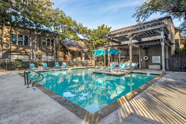 view of pool featuring a pergola and a patio area