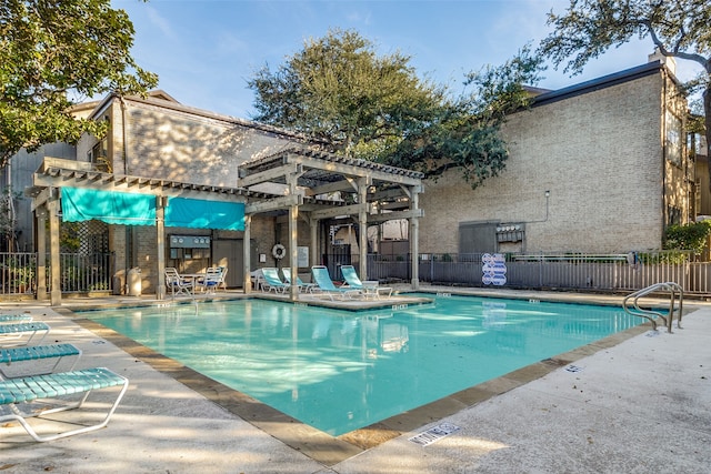 view of pool featuring a patio