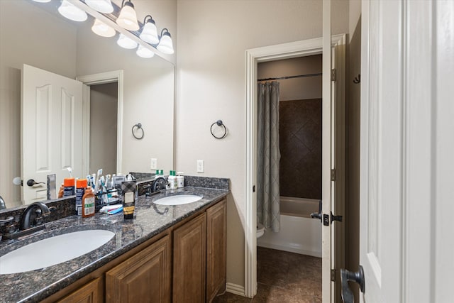 bathroom with tile patterned flooring, shower / bath combination with curtain, and vanity