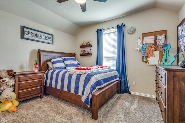 bedroom featuring ceiling fan, light carpet, and vaulted ceiling