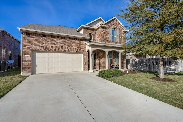 view of front facade featuring a porch, a garage, and a front lawn