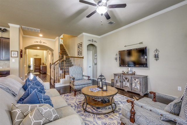 living room with ceiling fan, hardwood / wood-style floors, and crown molding