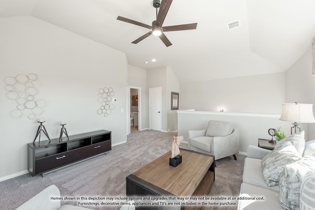 carpeted living room featuring ceiling fan and vaulted ceiling