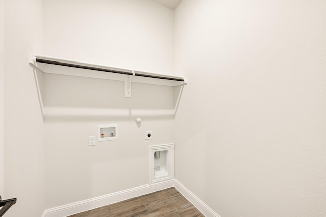 laundry room with hookup for a washing machine, hookup for a gas dryer, hookup for an electric dryer, wood finished floors, and laundry area