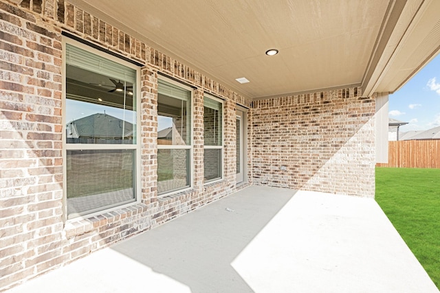 view of patio / terrace featuring fence