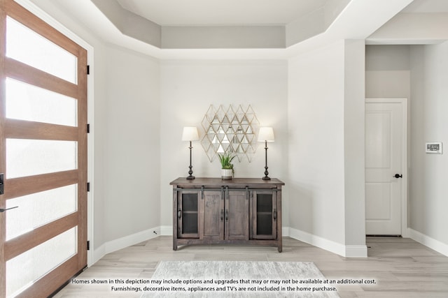 foyer entrance featuring light hardwood / wood-style floors