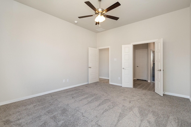 unfurnished bedroom with carpet and ceiling fan