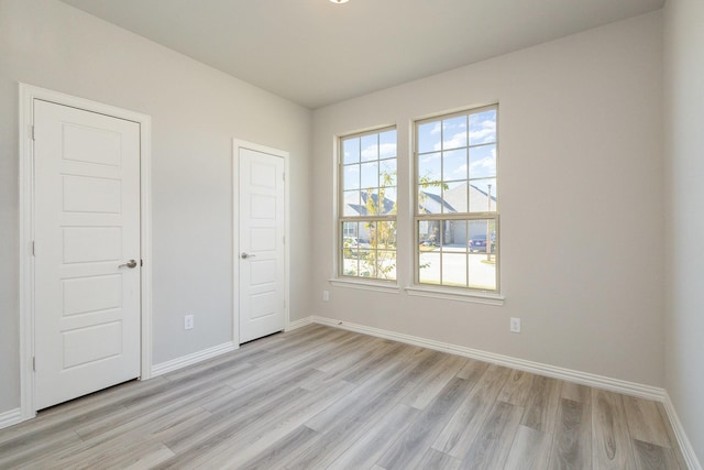 unfurnished bedroom featuring light hardwood / wood-style flooring