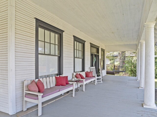 view of patio featuring a porch