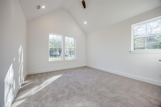 430 W Munson St, Denison, TX 75020 - spare room featuring healthy amount of natural light, light carpet, lofted ceiling, recessed lighting, and ceiling fan